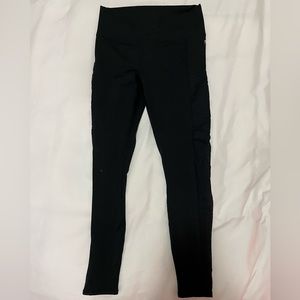 Fabletics On-the-Go PowerHold Black leggings with side pockets and mesh